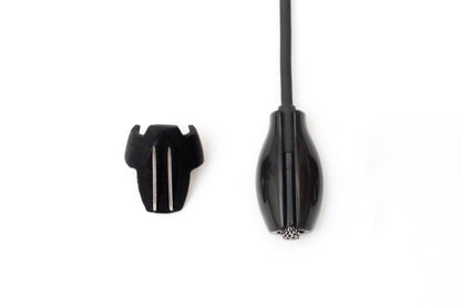 Black beetle-shaped clip with cord and two silver prongs, plus detached black cap