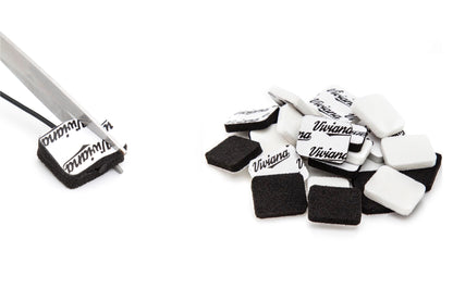 Black and white square foam pads with printed backing