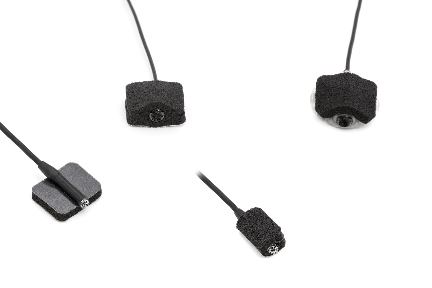 Black square foam pads attached to thin cords