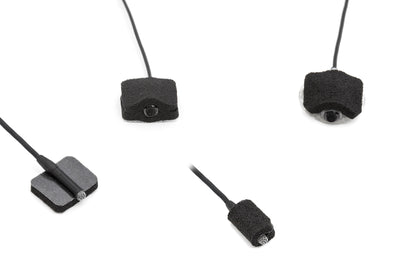 Black square foam pads attached to thin cords