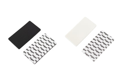 Assorted square foam pads: dark, white, and light beige