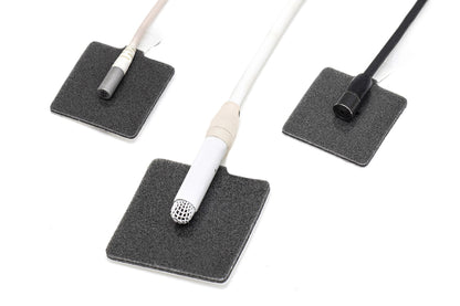 Adhesive foam dot stickers with white backing, two dots shown on handles