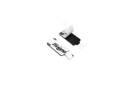 Dots premium stickers, black text on white backing, small rectangular pieces