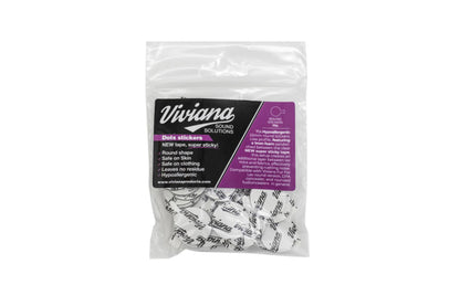 Front view of bagged white dot stickers with black text and purple label