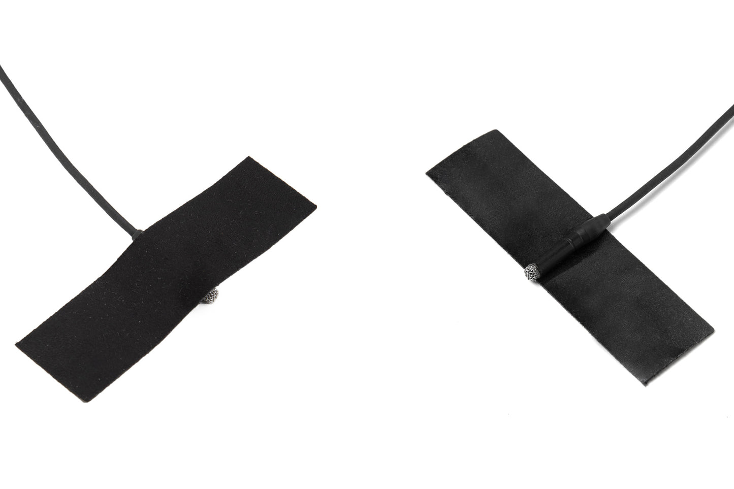 Moleskin Original adhesive patch strips on black cord, two crossed dark tabs