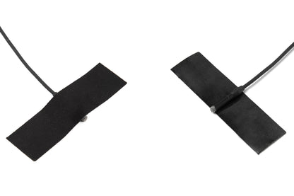 Moleskin Original adhesive patch strips on black cord, two crossed dark tabs