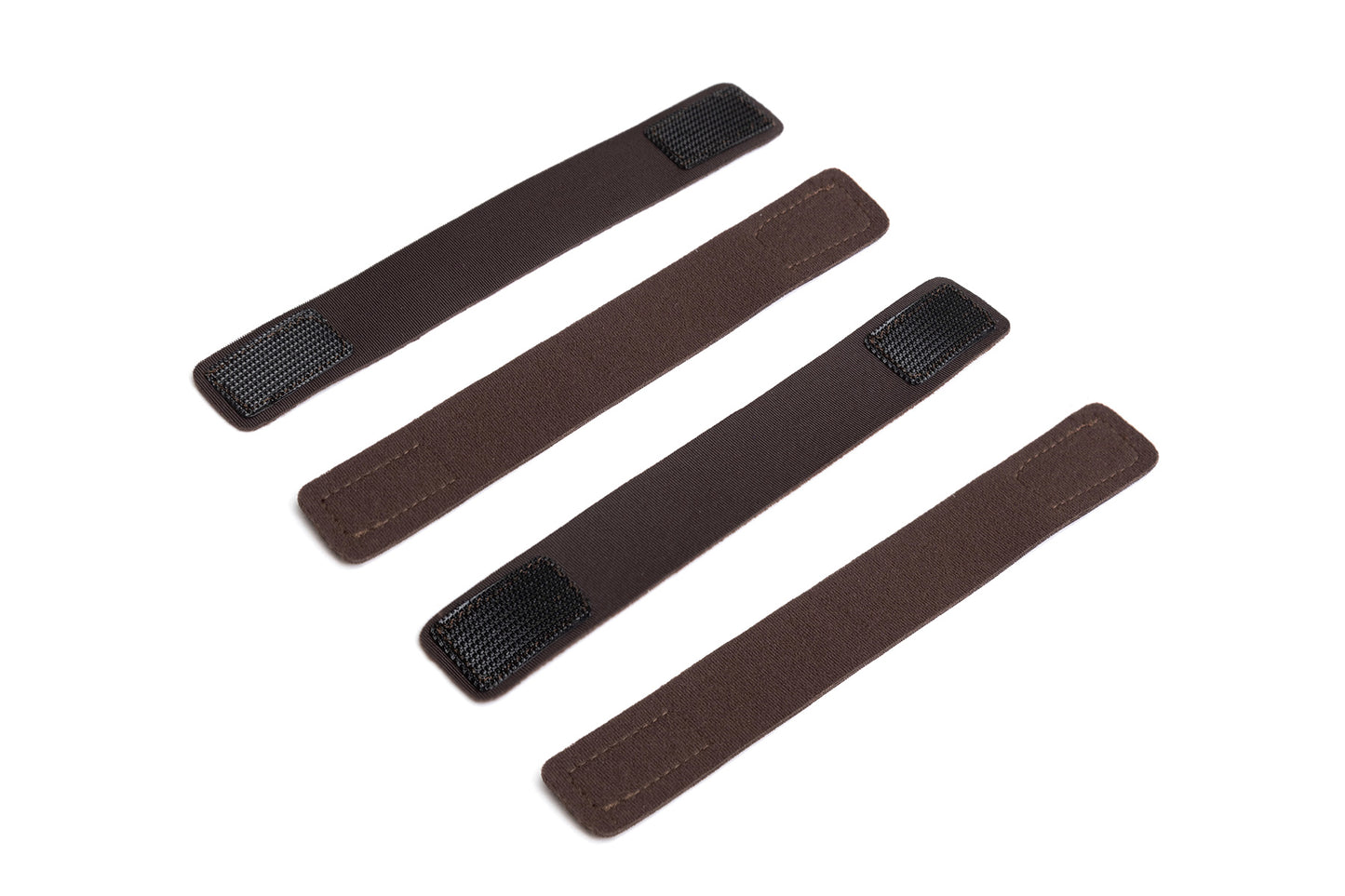 Set of four pouch protector straps in brown shades with textured tabs