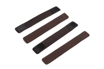 Set of four pouch protector straps in brown shades with textured tabs