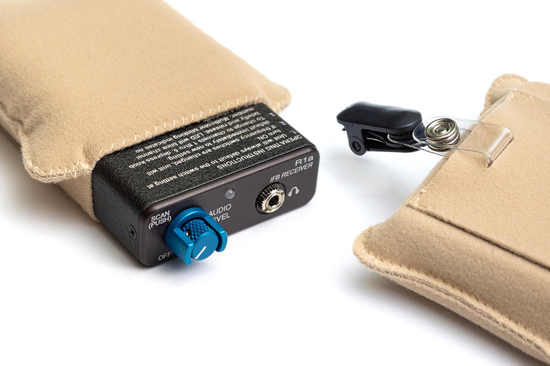 Beige pouch with open flap, small device and visible port panel