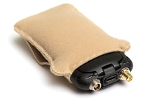 Beige pouch cover with clipped black controller and antenna connector