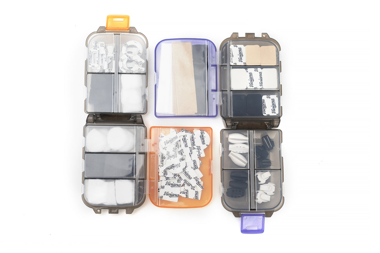 Multi-color accessory box set open with multiple labeled compartments and foam inserts