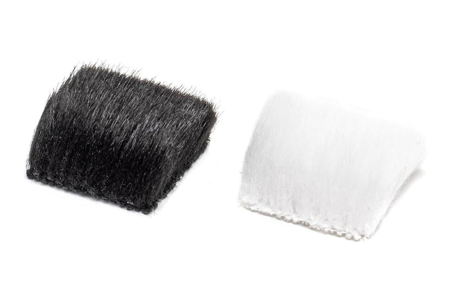 Black and white rectangular fur pads