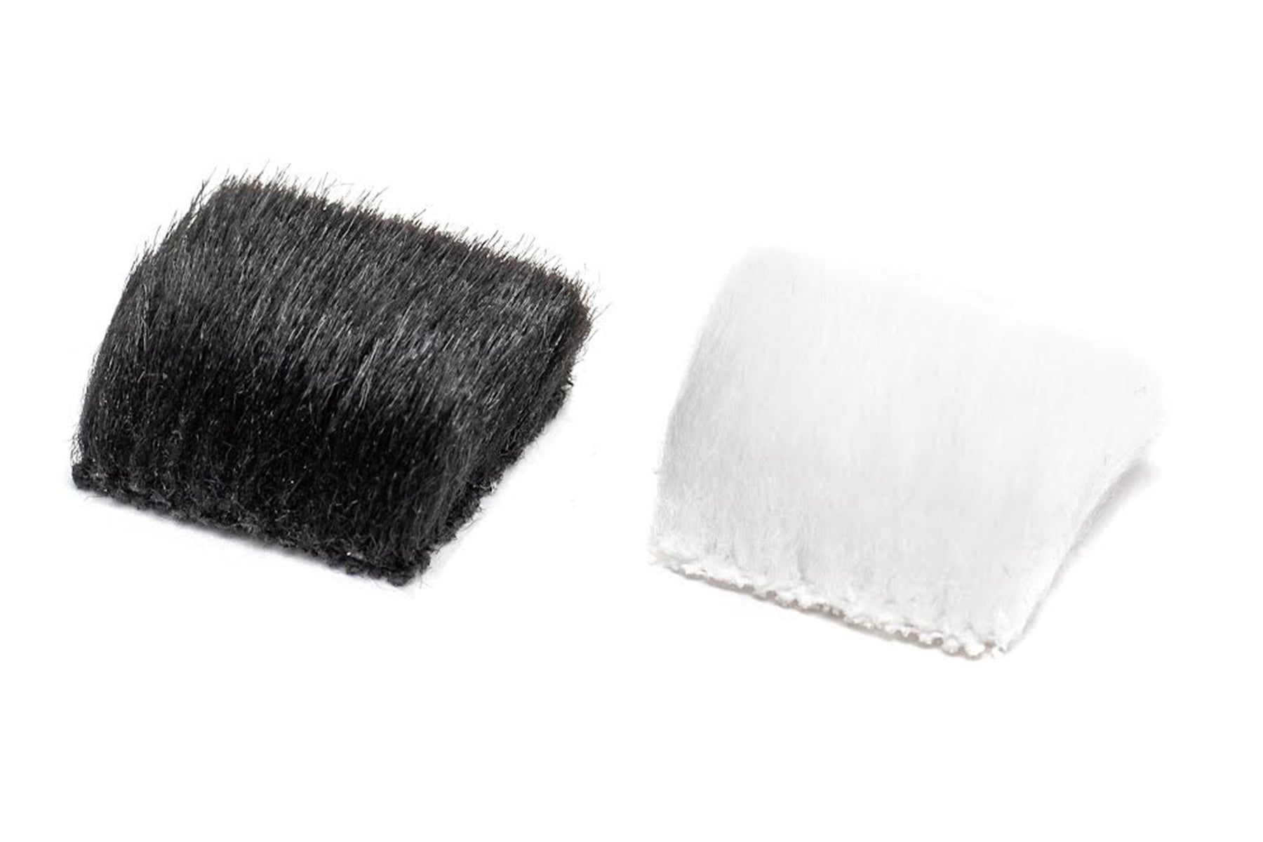 Black and white rectangular fur pads