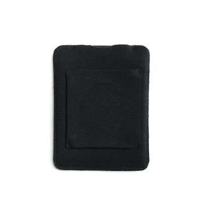 Black puffy belt pouch with inner patch panel and stitched square frame.
