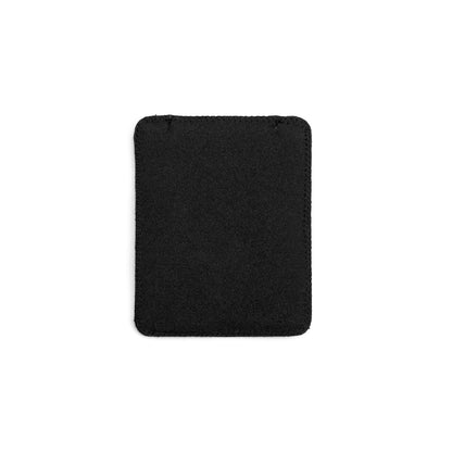 Black puffy pouch with stitched edges, square shape