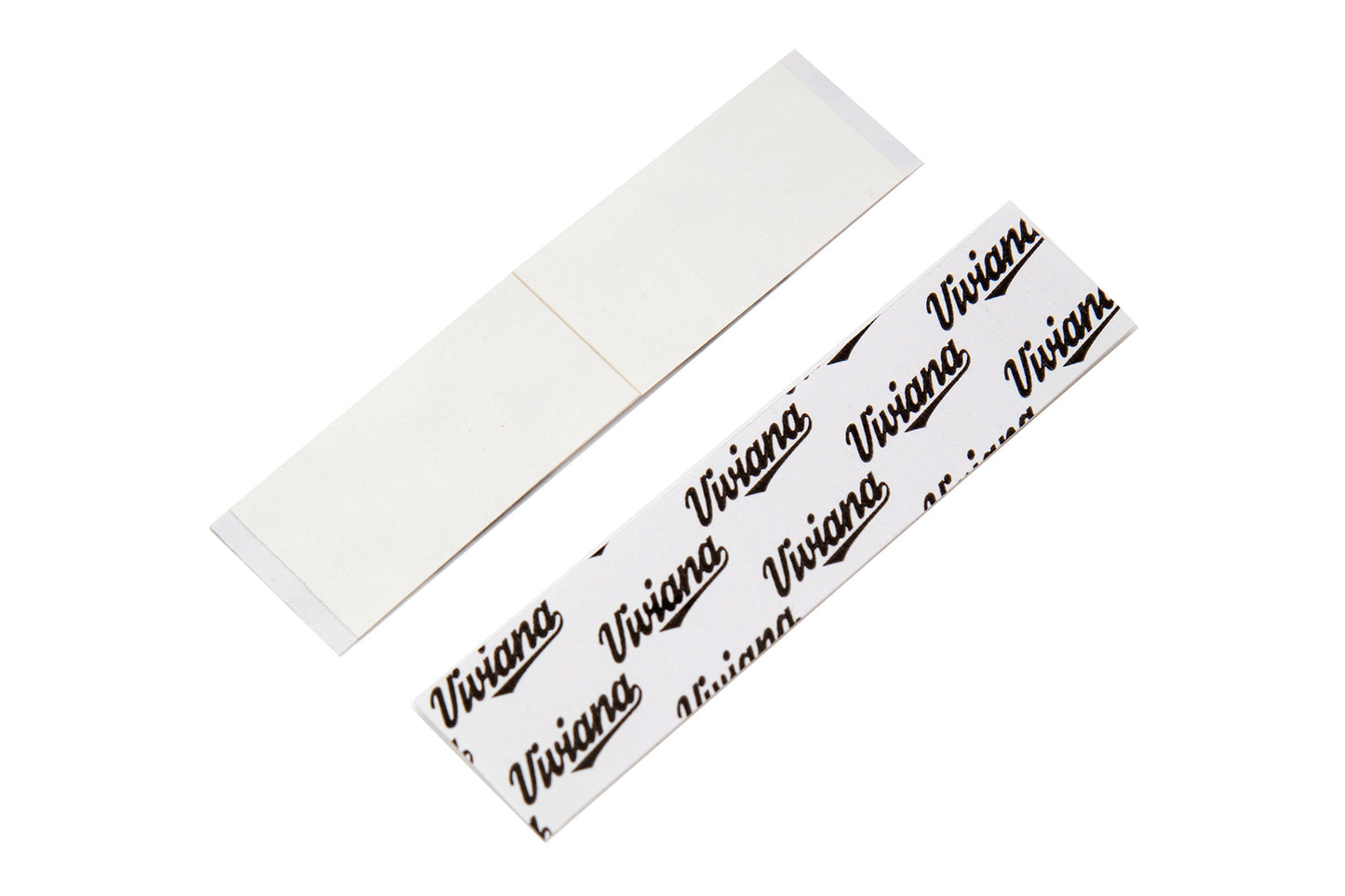 Double-sided white tape strips, thin rectangular pieces