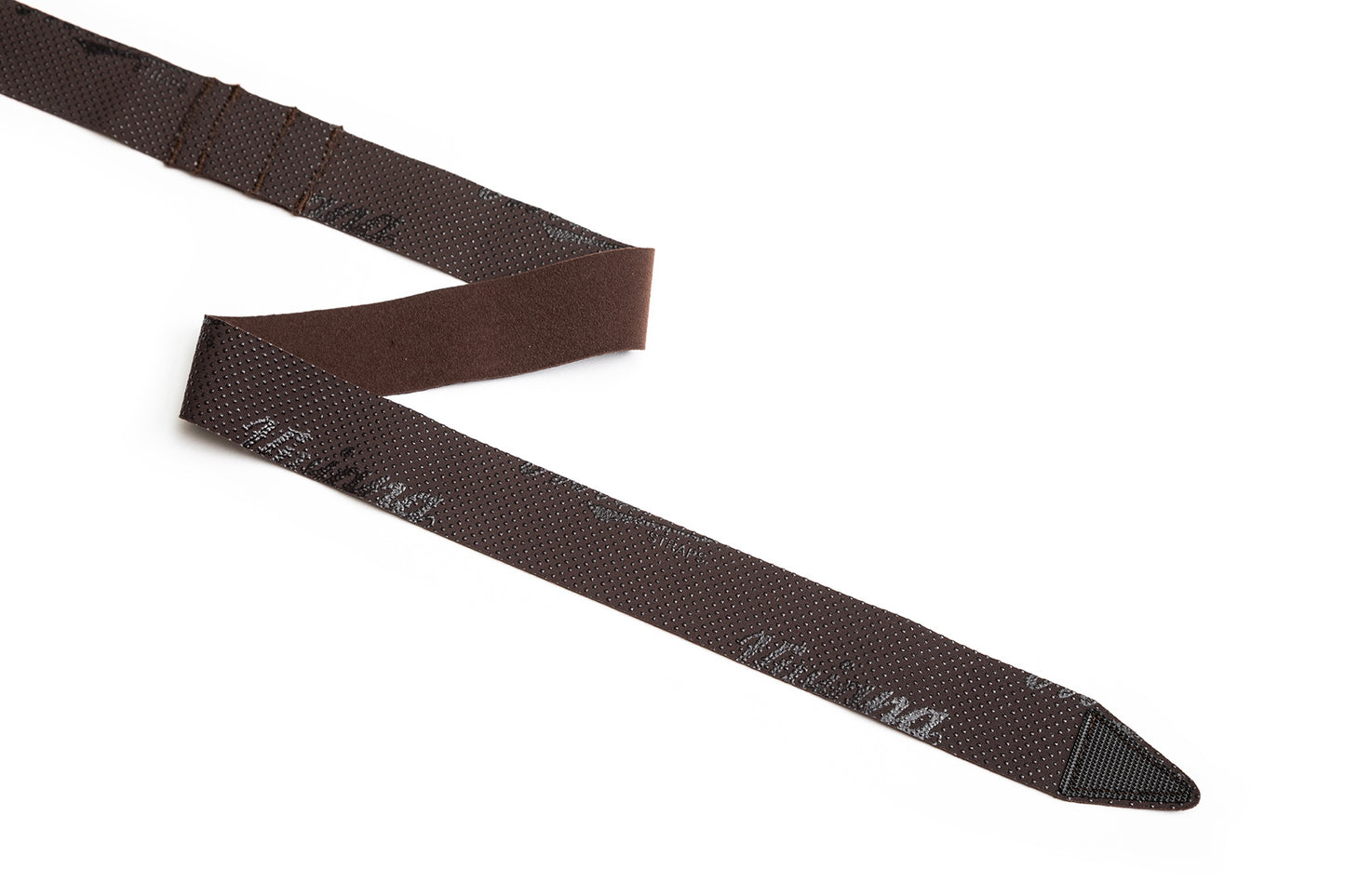 Dark brown chest strap with textured surface and tapered end