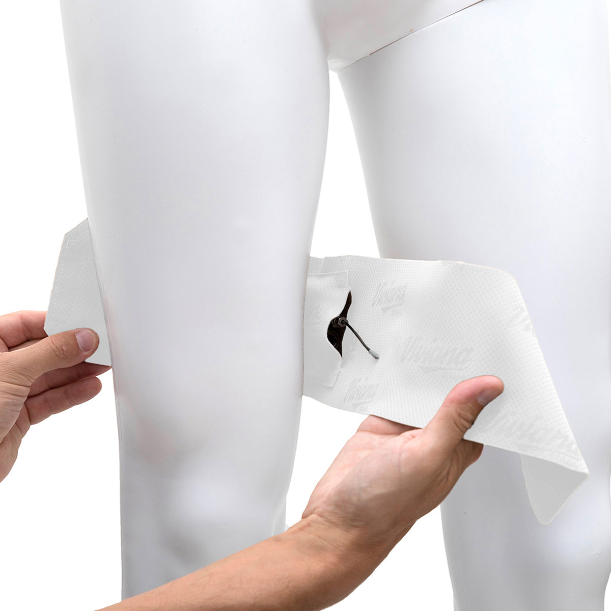 White thigh strap pouch shown being adjusted on leg, with cord and loop
