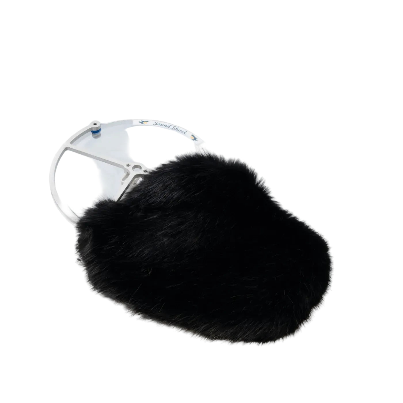 Black faux-fur microphone windscreen on a white microphone mount