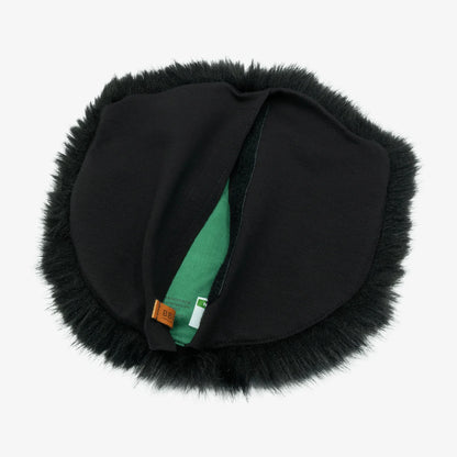 Black faux-fur microphone windscreen with green inner panel and centered seam