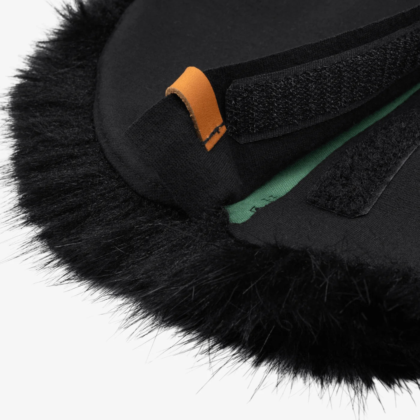 Black faux-fur microphone windscreen detail with black fabric seam and orange trim
