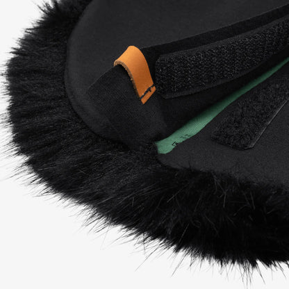 Black faux-fur microphone windscreen detail with black fabric seam and orange trim