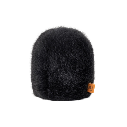 Light gray fuzzy microphone windscreen cap with brown logo tag