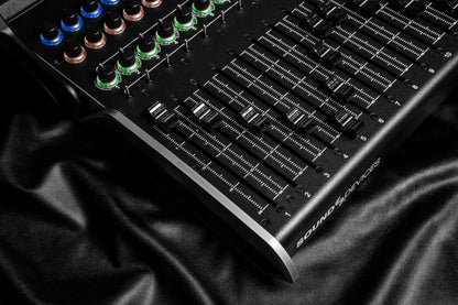 CL-16 audio mixer close-up of fader bank with colored LED indicators