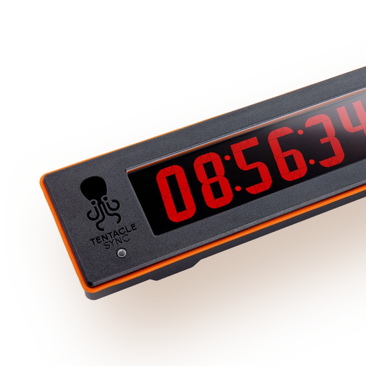 Multipurpose timecode display with red LED digits on black panel, orange border