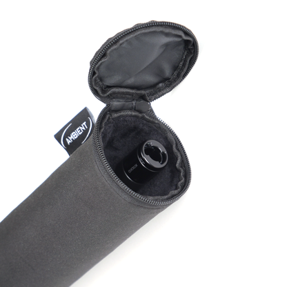 Open dark gray boom pole case showing interior pocket and black circular cap