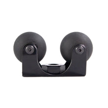 Black swing arm bracket with two rounded ends and central mounting screw