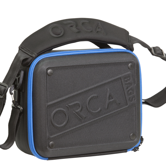 Medium hard shell accessory bag, charcoal gray with blue zipper and ORCA embossed front