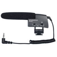 Sennheiser MKE 400 shotgun microphone with foam windscreen and control box, coiled cable