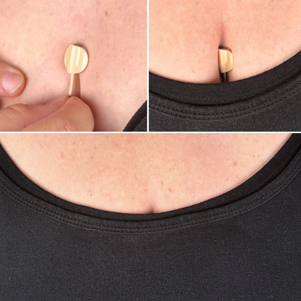 Mini sticky circles on black fabric neckline: small round adhesive dots ready to peel