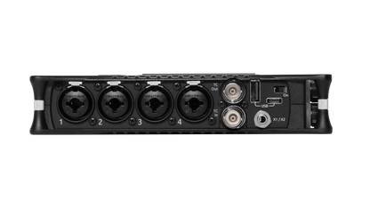 Black audio mixer rear panel with audio inputs and USB/connector area