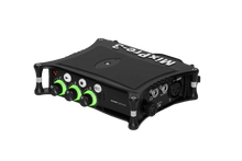 Portable audio recorder/interface with green knobs and control panel, black metal chassis.