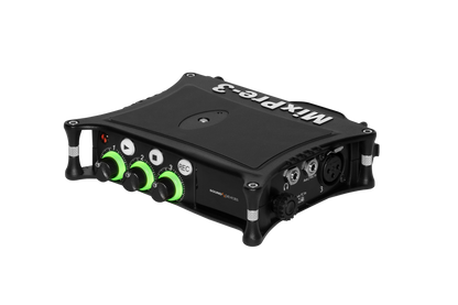 Portable audio recorder/interface with green knobs and control panel, black metal chassis.