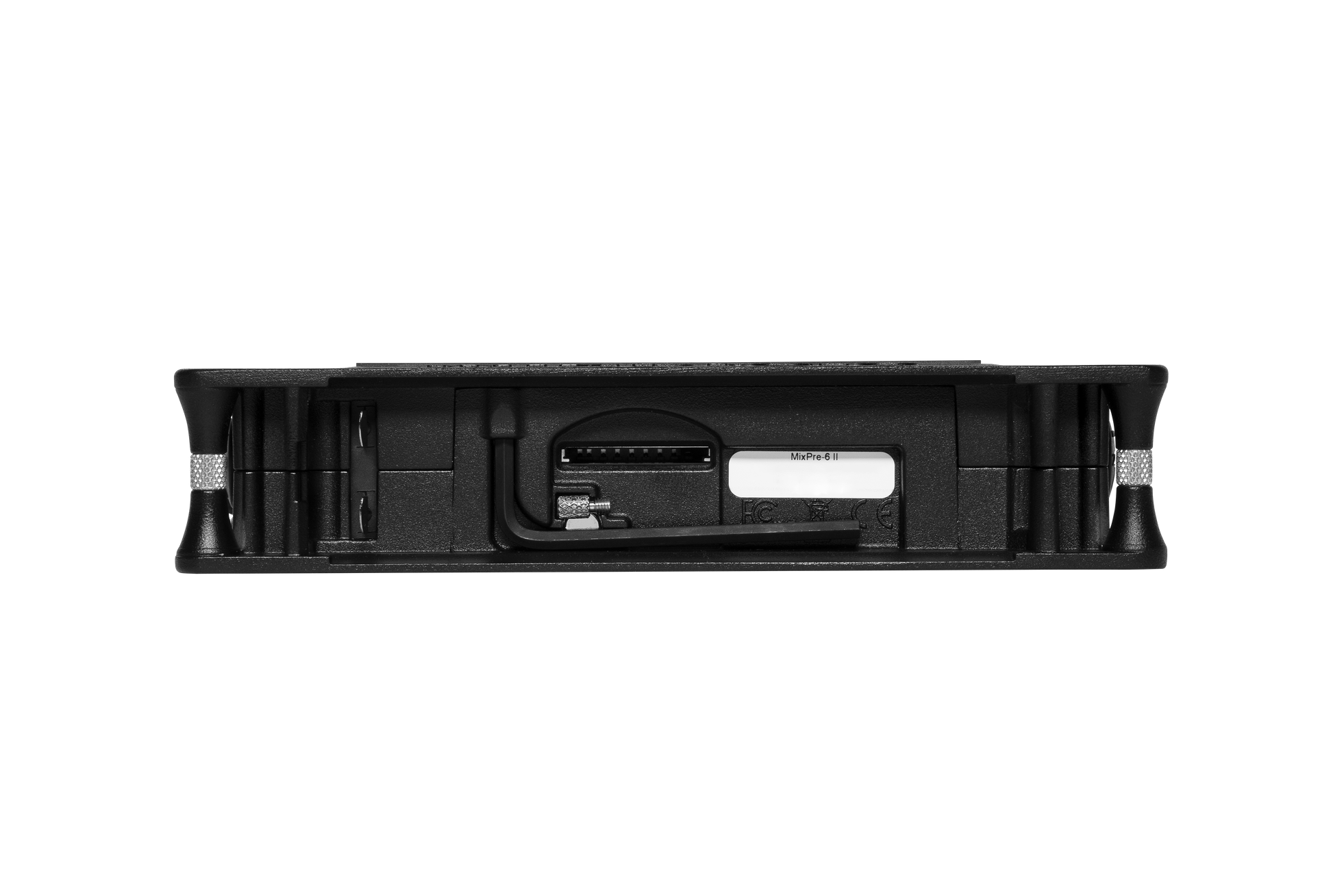 Rear panel of black audio mixer/preamp with port openings and connector area
