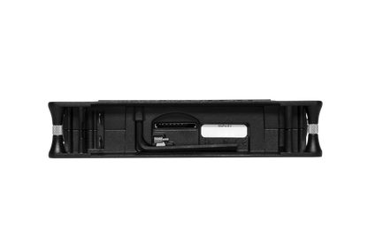Rear panel of black audio mixer/preamp with port openings and connector area