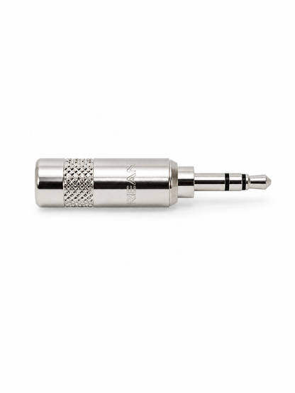 Silver audio connector plug with textured grip sleeve and metal tip