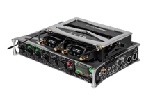 SL-2 audio device with black-and-silver chassis, front display, and control knobs