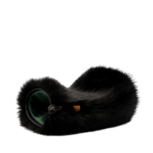 Black plush spacer cover with looped button and green-lined opening.