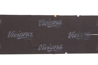 Dark brown calf strap close-up with grid texture and central seam panel.