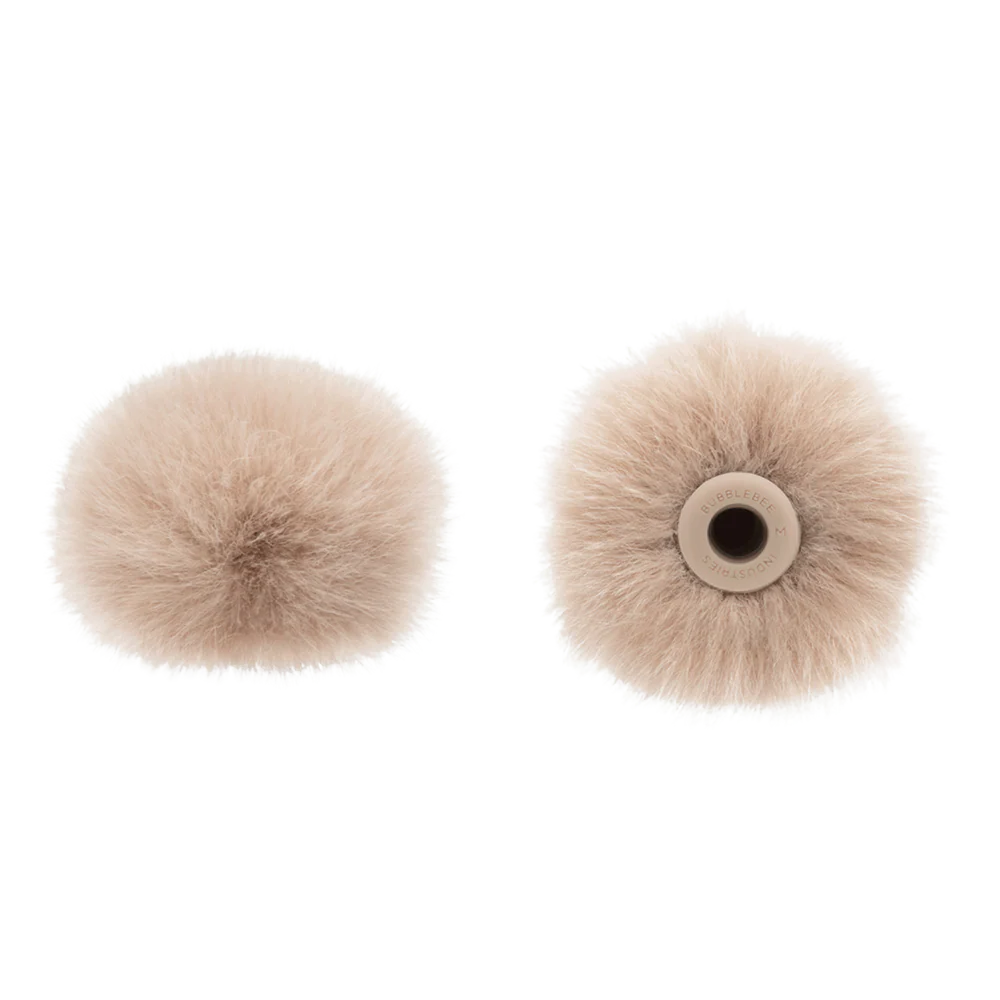 Beige circular microphone windscreen, front and back