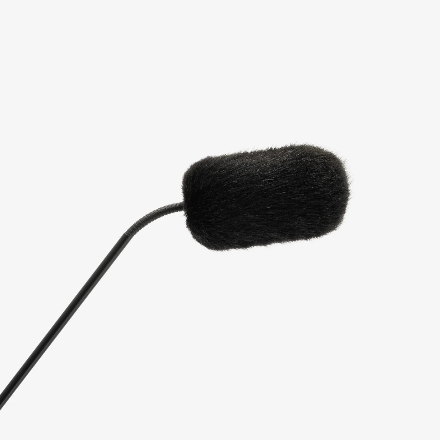 Black furry windscreen mounted on a cable for DPA microphone