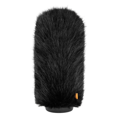 Hair brush attachment close-up of dark bristle top with gray base, orange label