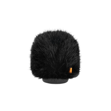 Hair brush attachment small top view of dark bristles with orange label