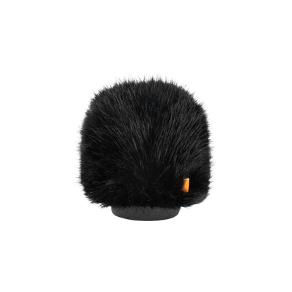 Hair brush attachment small top view of dark bristles with orange label